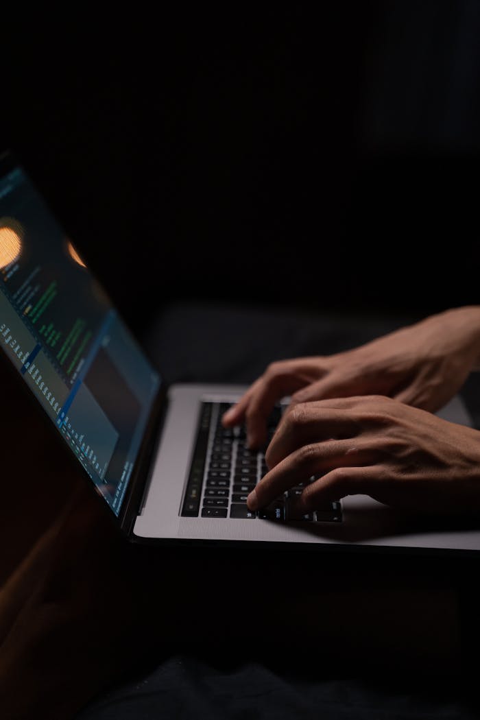 pexels-photo-5496464 Person Using Silver and Black Laptop Computer